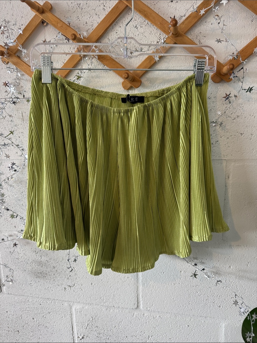 Green flowy pleated shorts